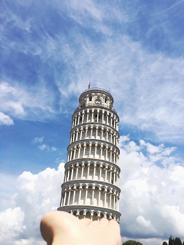 Italian leaning tower of Pisa on the palm of my hand // mobile stock photo made with iPhone 6s