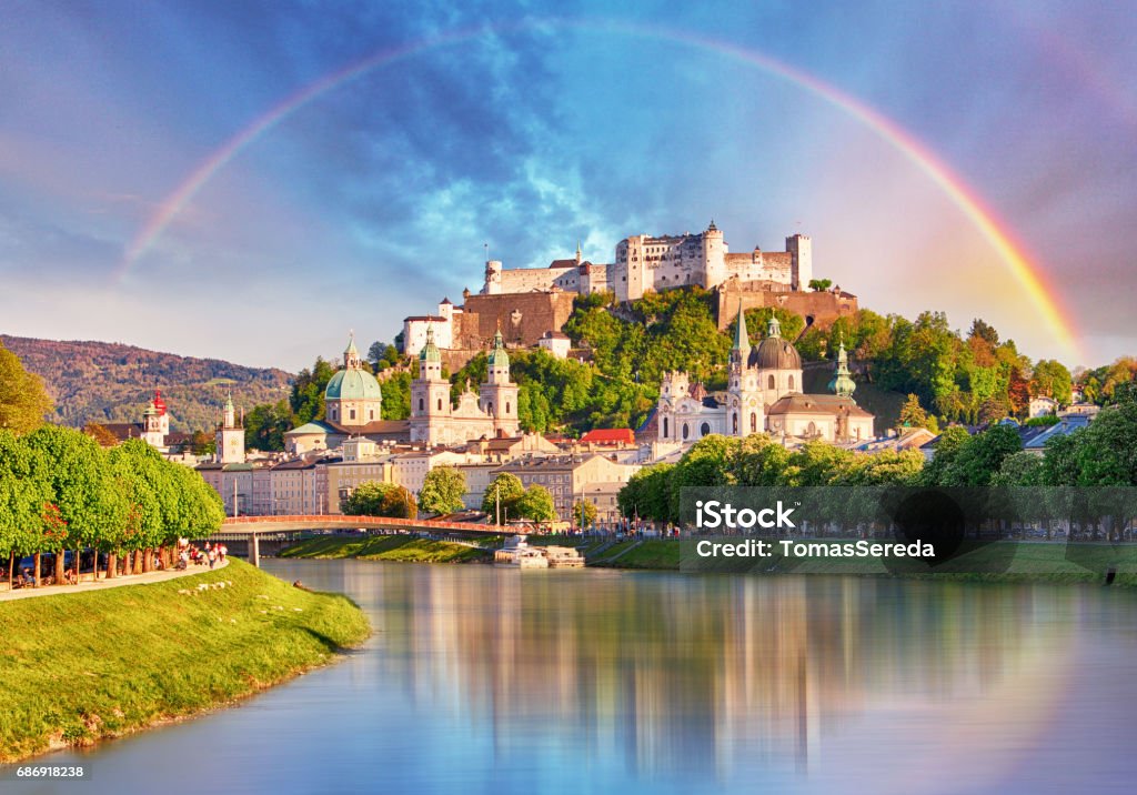 Austria, Rainbow over Salzburg castle Salzburg Stock Photo