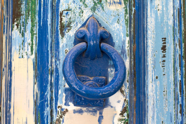 istock Malta: Blue Door Knocker on Vibrant Blue DIstressed Door (Close-Up) 686924794