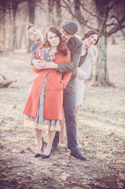 Happy Couple with Friends on Wedding Day