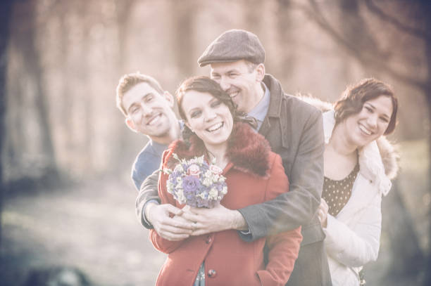 istock Happy Couple with Friends on Wedding Day 686925280