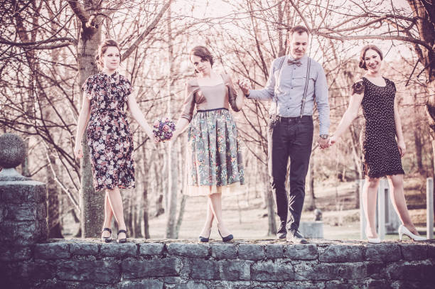 Happy Couple with Friends on Wedding Day