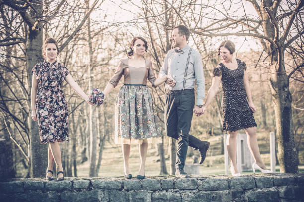 Happy Couple with Friends on Wedding Day