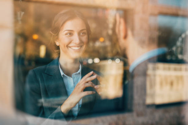 istock Business people talking at the window 686925420