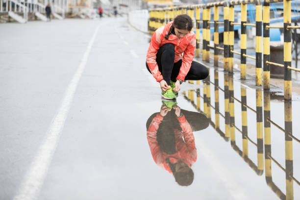 istock Tying sports shoes 686925582