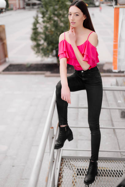 istock One girl pose to camera near the wall 686928992