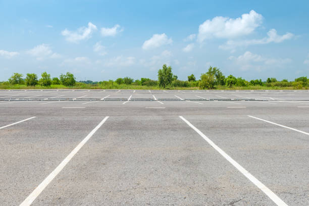istock Empty parking lot against a beautiful blue sky 686941934