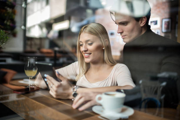 istock Couple in coffee shop 686945720