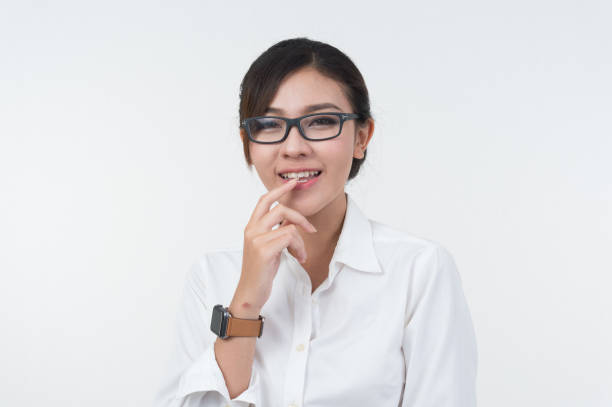 istock Business woman posing on whiteboard on white background 686946550