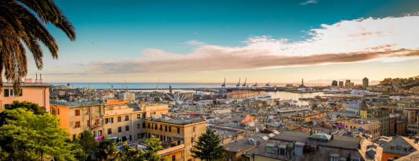 genova old town and harbor city panorama. - old crane blue sky imagens e fotografias de stock