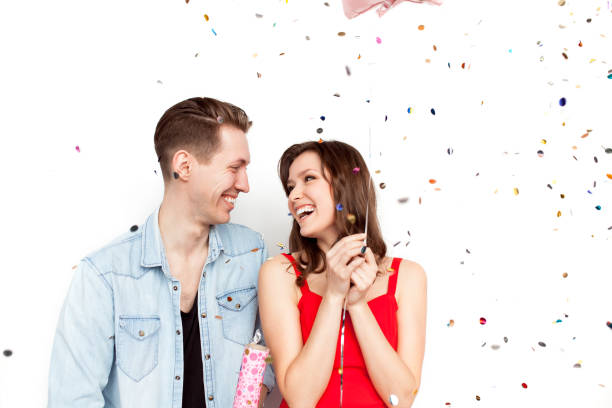 istock Lovely young couple in confetti 686947678