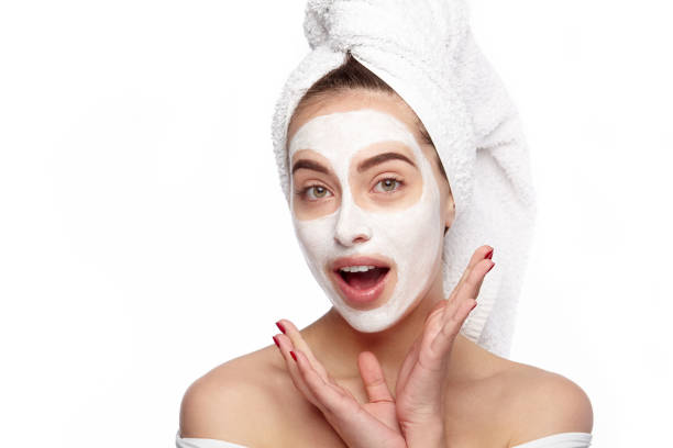 istock Amazed woman with cosmetics mask 686952530