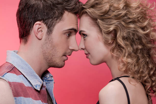 istock young couple in love looking at each other 686956490