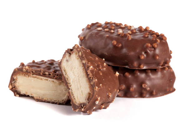 istock chocolate candy with white cream filling isolated on white background 686968624