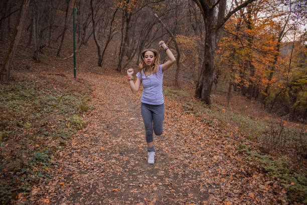 istock Girl exercising in a park 686969788