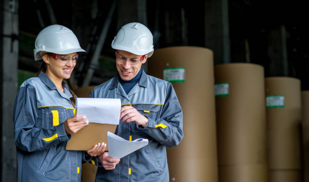 istock workers at a paper mill factory 686970464