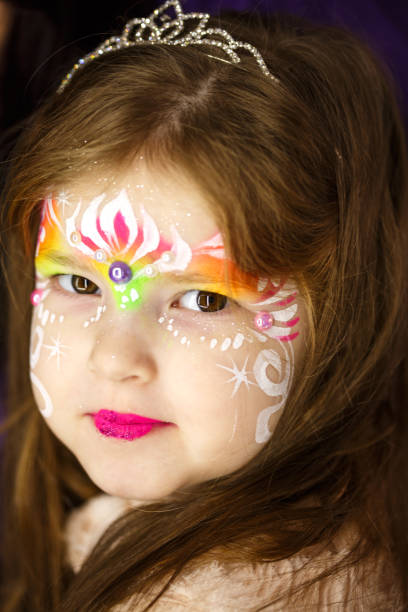 istock Smiling little girl with face paint 686975130