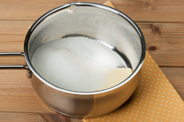 istock Butter And Sugar In Sauce Pan. Cooking Process. Bakery Preparation. 686995784