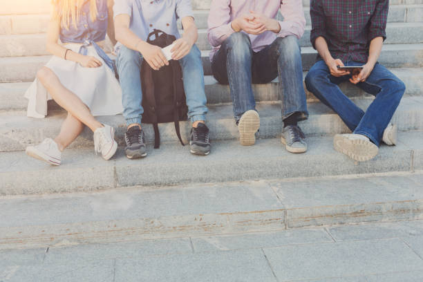 istock Group of people with gadgets outdoor, copy space 686996870