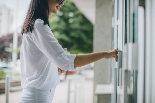 istock Woman hand opening door 687006120