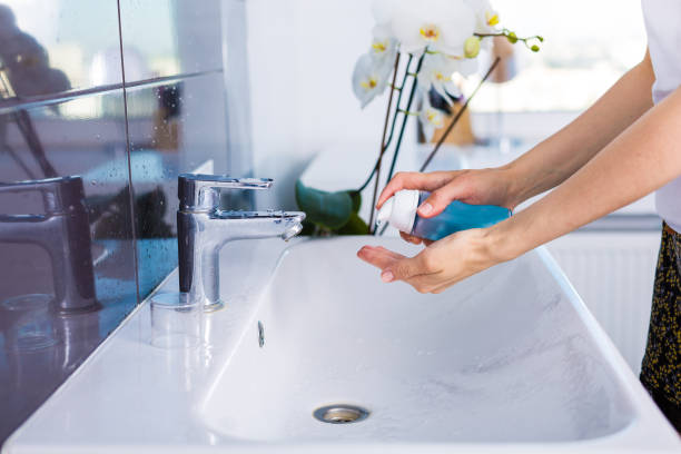 istock Woman washing up in the morning 687011182