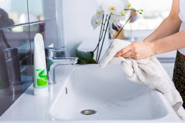 istock Woman washing up in the morning 687012242