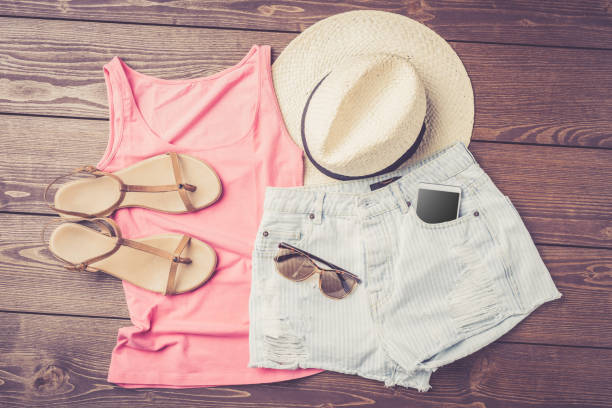 istock Casual female outfit on wooden table 687017160