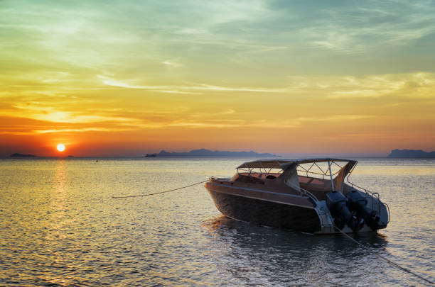 Motorboat at sunset. Beautiful landscape.