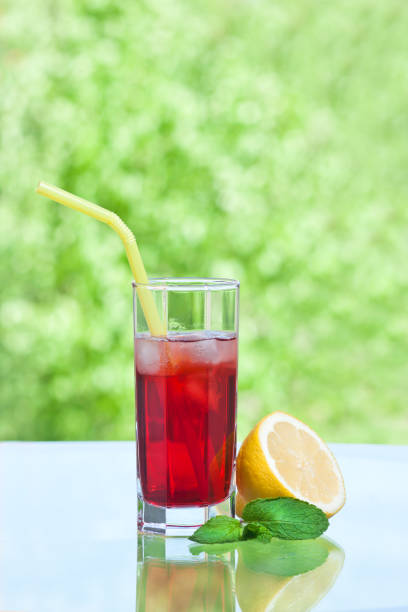 istock Cocktail with orange, Cherry, pomegranate juice in a glass 687031202