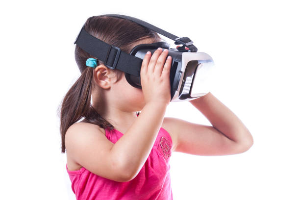 istock Little girl with virtual reality glasses 687072824