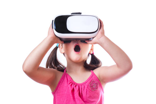 istock Little girl with virtual reality glasses 687072830