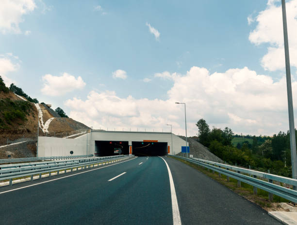 istock tunnel on the highway 687077790