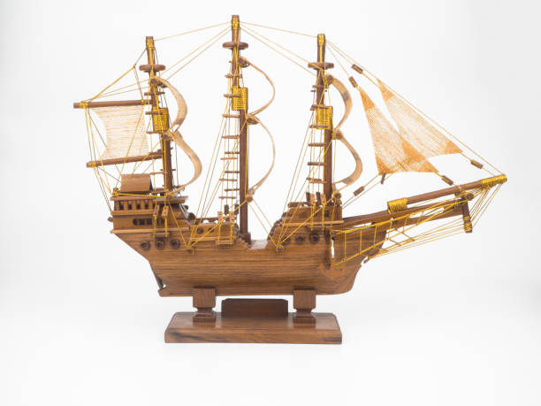 istock wooden ship model isolated on white background 687078996