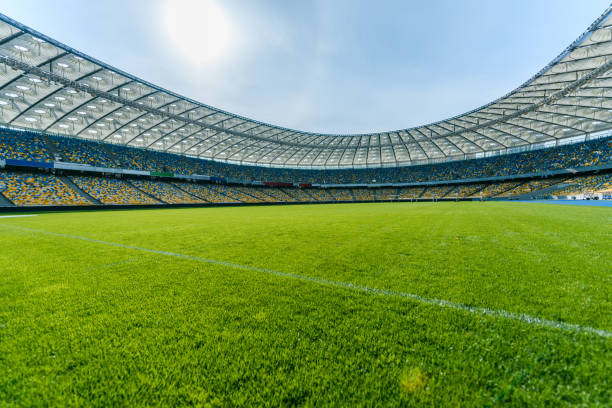 Panoramic view of soccer field stadium and stadium seats Panoramic view of soccer field stadium and stadium seats stadium stock pictures, royalty-free photos & images