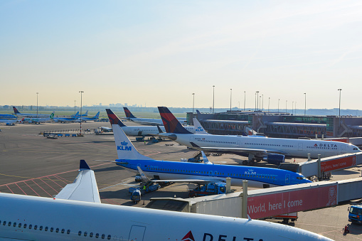 Amsterdam, Netherlands - Circa April 2017: Schiphol Airport skydeck view, airplanes waiting the departure, KLM, Detla Airlines and another companies.