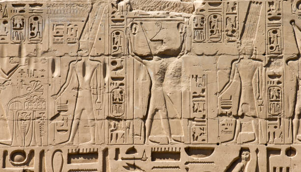 istock old egypt hieroglyphs carved on the stone 687096388