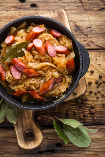 istock Cabbage braised with sausages, sauerkraut. German cuisine. 687100092