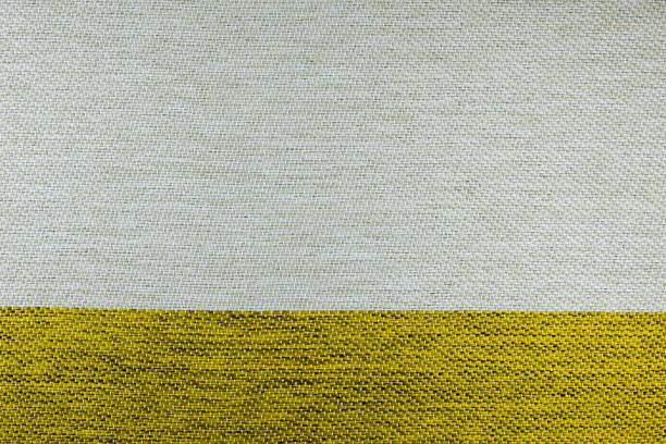 istock white and gold fabric detail texture 687112950