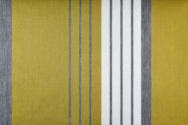 istock white and gold fabric detail texture 687113036