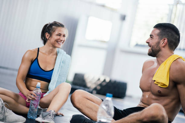 istock Couple having fun in gym 687121358