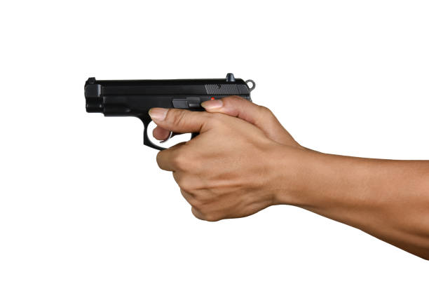 istock a hand with handgun thumb forward position gripping 687124776