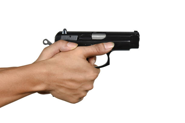 istock a hand with handgun lefty thumb forward position gripping 687124794