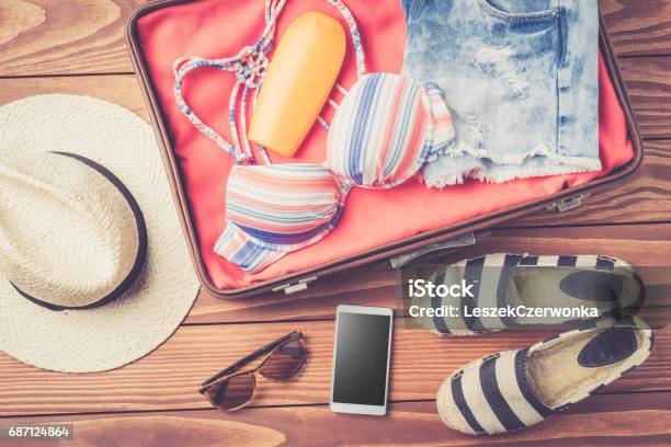 Open Bag With Beach Accessories And Clothes Stock Photo - Download Image Now - Suitcase, Beach, Open