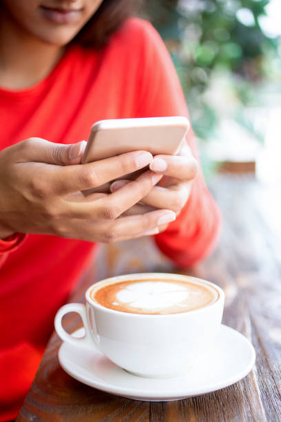 istock Businesswoman checking message on smartphone 687128088