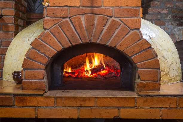 istock The fire burns in a wood pizza oven 687128918