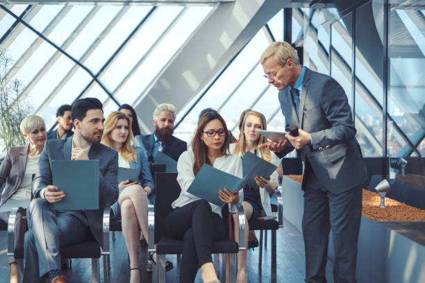 istock Business people at seminar 687148884