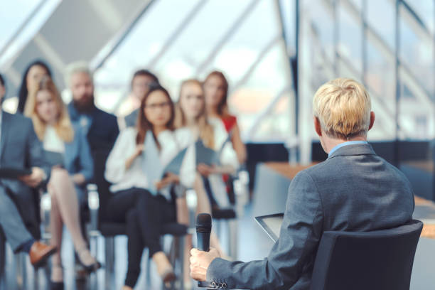 istock Business people at seminar 687149346