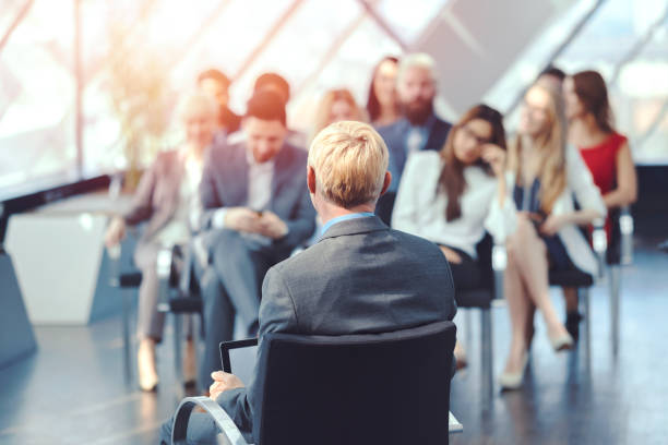 istock Business people at seminar 687149464