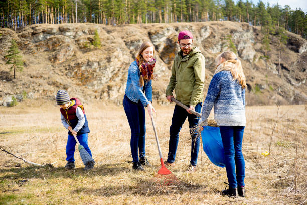 istock Family is cleaning outside 687152052