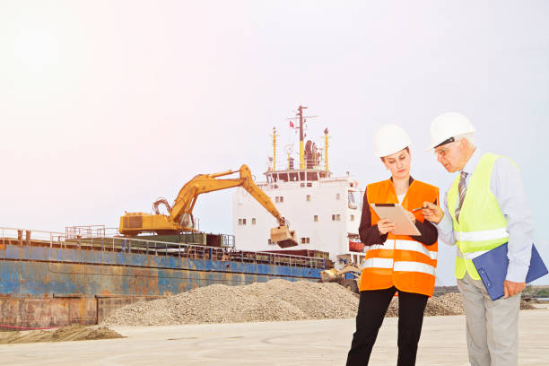 istock Attractive young female engineer and her boss 687159428